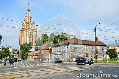 RIGA / LATVIA - July 27, 2013: Street in city of Riga with tall building of Latvian Academy of Sciences in background Editorial Stock Photo