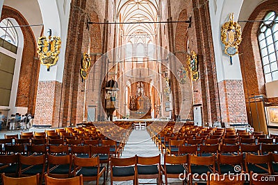 Riga Latvia. Nave Of St. Peter's Church. Central Part Of Interior Editorial Stock Photo