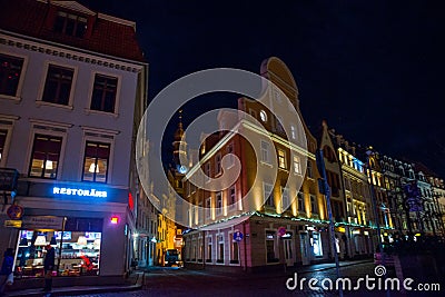 Riga, Latvia: Night new year street in the old town with lighting. Christmas old town Editorial Stock Photo