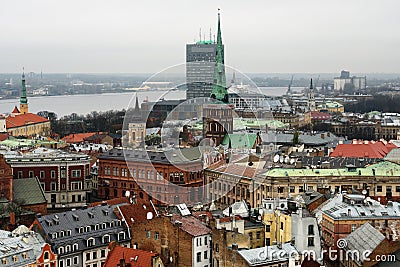 Riga, Latvia, November 2019. A modern high-rise building in the middle of a medieval city. Editorial Stock Photo