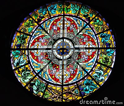 Antique rosette stained glass window in the Riga Dome Cathedral in Riga, Latvia Editorial Stock Photo