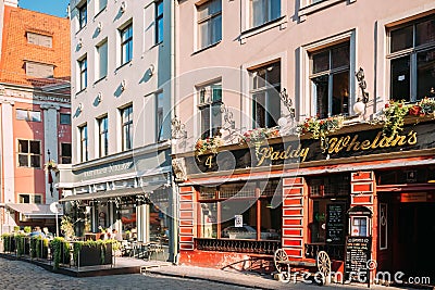 Riga, Latvia. Paddy Whelans Irish Pub And Sports Bar In Grecinieku Street In Summer Day. Editorial Stock Photo