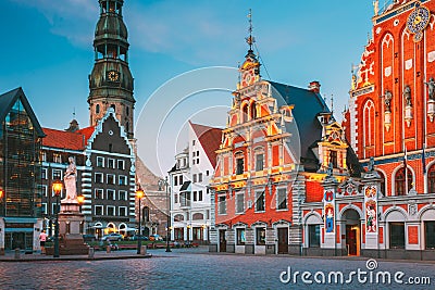 Riga, Latvia. Scenic Town Hall Square With St. Peter's Church, Schwabe House, House Of Blackheads. Popular Showplace Editorial Stock Photo