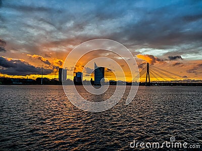 Riga in the sunset from birds view. Towers Editorial Stock Photo