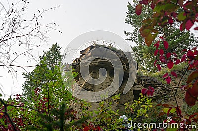 Right autumn vegetation in the taiga of the North on the mountainside on the background of positional anomalies. Stock Photo