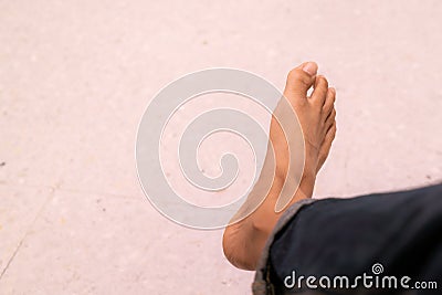 Right foot and long pants jean Stock Photo