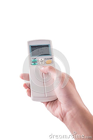 Right hand holding remote air conditioner turn up to 27 celcius Stock Photo