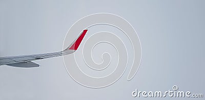 Right jet plane wing in mist that make the turbulence Stock Photo