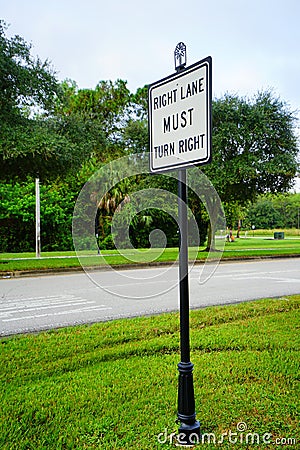 Right LANE MUST TURN right. Stock Photo