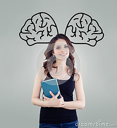 Right and left hemispheres of the brain. Happy woman student with book Stock Photo