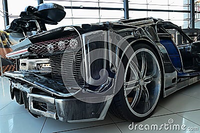 Right rear view junkyard masterwork replica of Bugatti Chiron sport car made of scrap metal Editorial Stock Photo