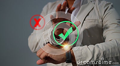 Right, and wrong icons with men's hand choosing the right icon. Stock Photo