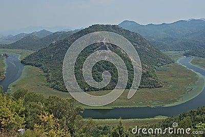 Rijeka CrnojeviÄ‡a, part of the Skadar Lake in Montenegro. Tourist cruises by boat on the beautiful meanders of the river flowing Stock Photo