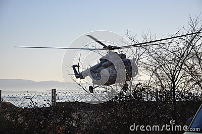 Rijeka 14.2.2023. Croatia.Military helicopter maneuvers in the blue sky.Air force Mil Mi-171Sh in Croatian sky. Editorial Stock Photo