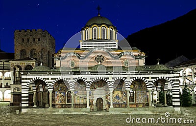 Rila monastery with a falling star Stock Photo