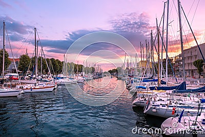 Rimini. Italy. Sea boats in marina at the sunrise. Editorial Stock Photo