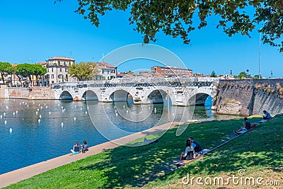Rimini, Italy, September 2, 2021: Bridge of Tiberius (Ponte di T Editorial Stock Photo