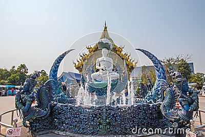 Rimkok district,Chiang Rai Province,Northern Thailand on January 19,2020:The fountain,white Buddha statue and angellic guardians Editorial Stock Photo