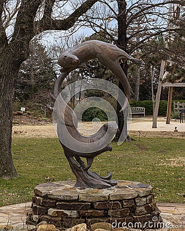 `Ring of Bright Water` by Kent Ullberg in the garden behind the National Cowboy and Western Heritage Museum in Oklahoma City. Editorial Stock Photo