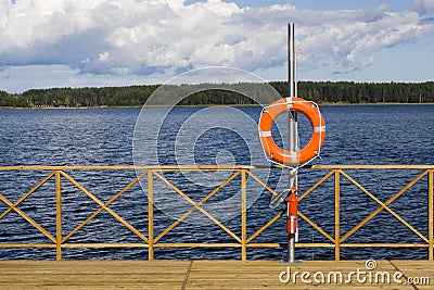 Ring buoy on the berth Stock Photo