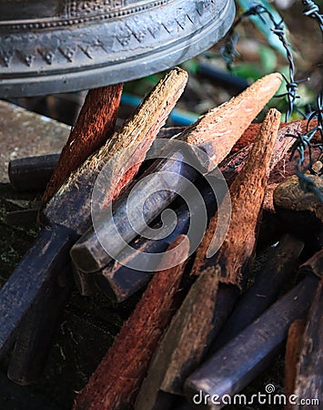 Ring or chime the bells in temple with wood sticks. The Bell symbolizes wisdom and compassion, which Buddhist practitioners recogn Stock Photo