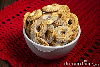 Ring Coconut biscuits served on a bowl. Brazilian little donut. Seletive focus Stock Photo