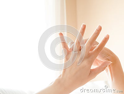 Ring on the finger young bride close up Stock Photo