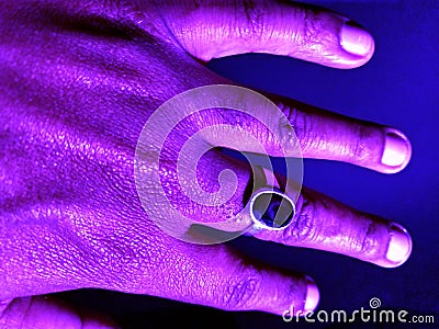 Ring with gomed nug in hand Stock Photo