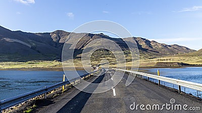 The ring road in Iceland leads over a bridge, Snaefellsnes. Stock Photo