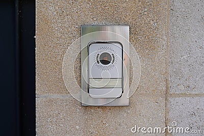 Ring surveillance video on modern house with contemporary doorbell near door Stock Photo