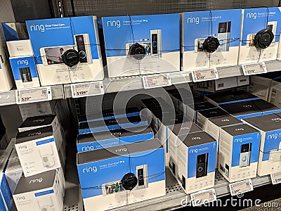 Ring Video Doorbell, Stick Up Cam, Battery and Chime for sale on shelf Editorial Stock Photo