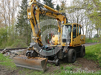 A machine that can drive on rails and on a road Editorial Stock Photo