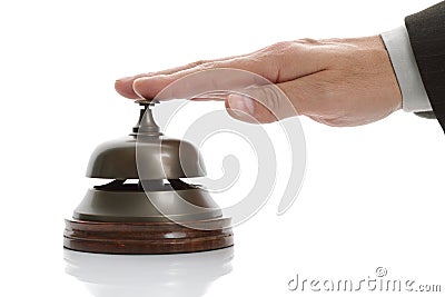 Ringing hotel reception bell Stock Photo