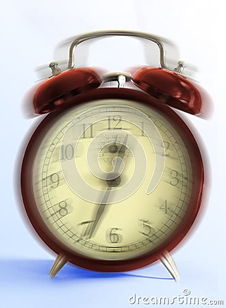 Ringing old style alarm clock (movement blur) Stock Photo