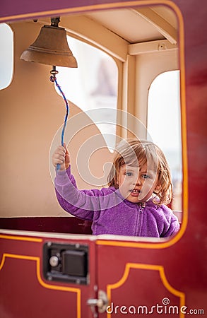 Ringing a train bell Stock Photo