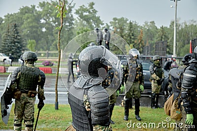 Riot police in full tactical gear ready to confront protesters in Belarus Editorial Stock Photo