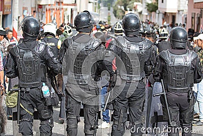 Riot police at the Inti Raymi in Ecuador Editorial Stock Photo