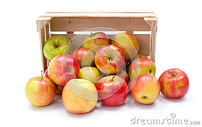 Ripe apples in wooden crate Stock Photo