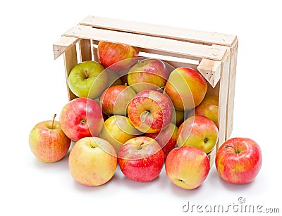 Ripe apples in wooden crate Stock Photo