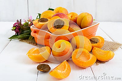 Ripe apricots in a ceramic bowl Stock Photo