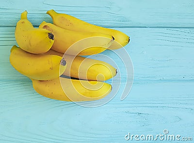 Ripe bananas on a blue wooden background Stock Photo