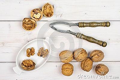 Ripe brown walnut on grey wood Stock Photo