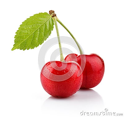 Ripe cherry berries with green leaf isolated on white Stock Photo
