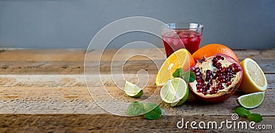 Ripe Citrus Fruit on the Old Wooden Table. Orange, Lime, Lemon Mint. Healthy Food. Summer Background. Stock Photo