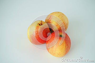 Ripe fruit. Pears and apples on a white background. Stock Photo