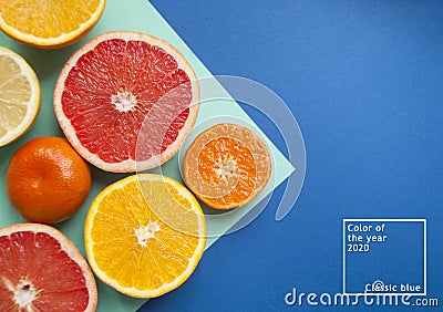 Ripe grapefruit on blue background Editorial Stock Photo