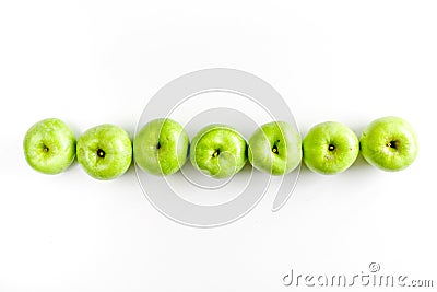 Ripe green apples white table background top view space for text Stock Photo