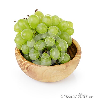 Ripe green grapes in wood bowl Stock Photo