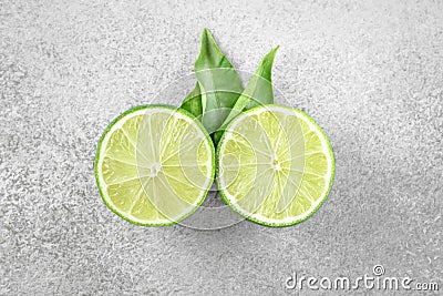 Ripe green lime citrus fruit with leaf Stock Photo