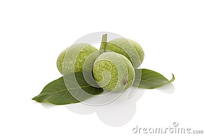 Ripe green wallnuts Stock Photo